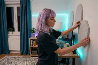 Mira adding simple acoustic panels in a small apartment workspace
